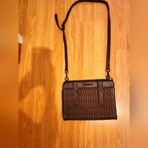 Matt and Natt cross body brown embossed purse.